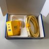 charger 11 | New Bridge Services Yellow NBS Quick Charger and a braided beige USB-C cable tucked in a blue box, ready for use.